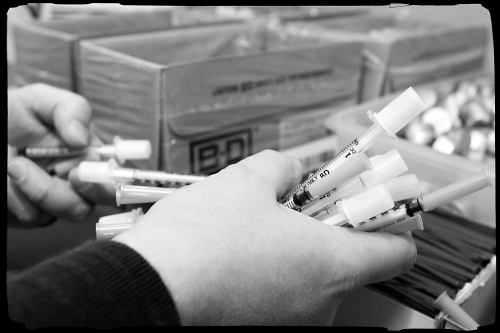 Needles collected for dispersal at the Syringe Exchange Program at Outside In. Photo by Kristina Wright